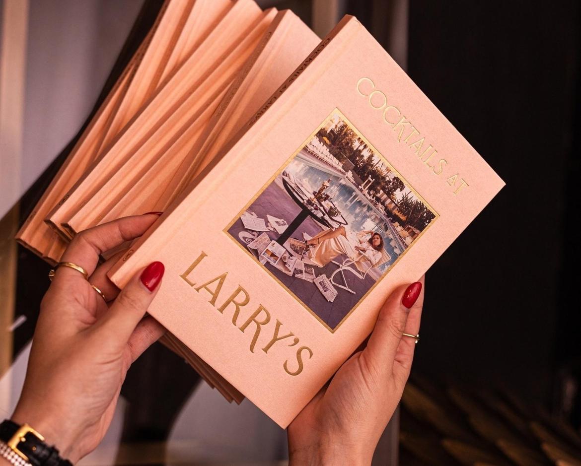 Cocktails at Larry’s: A Toast to Art and Iconic British Figures